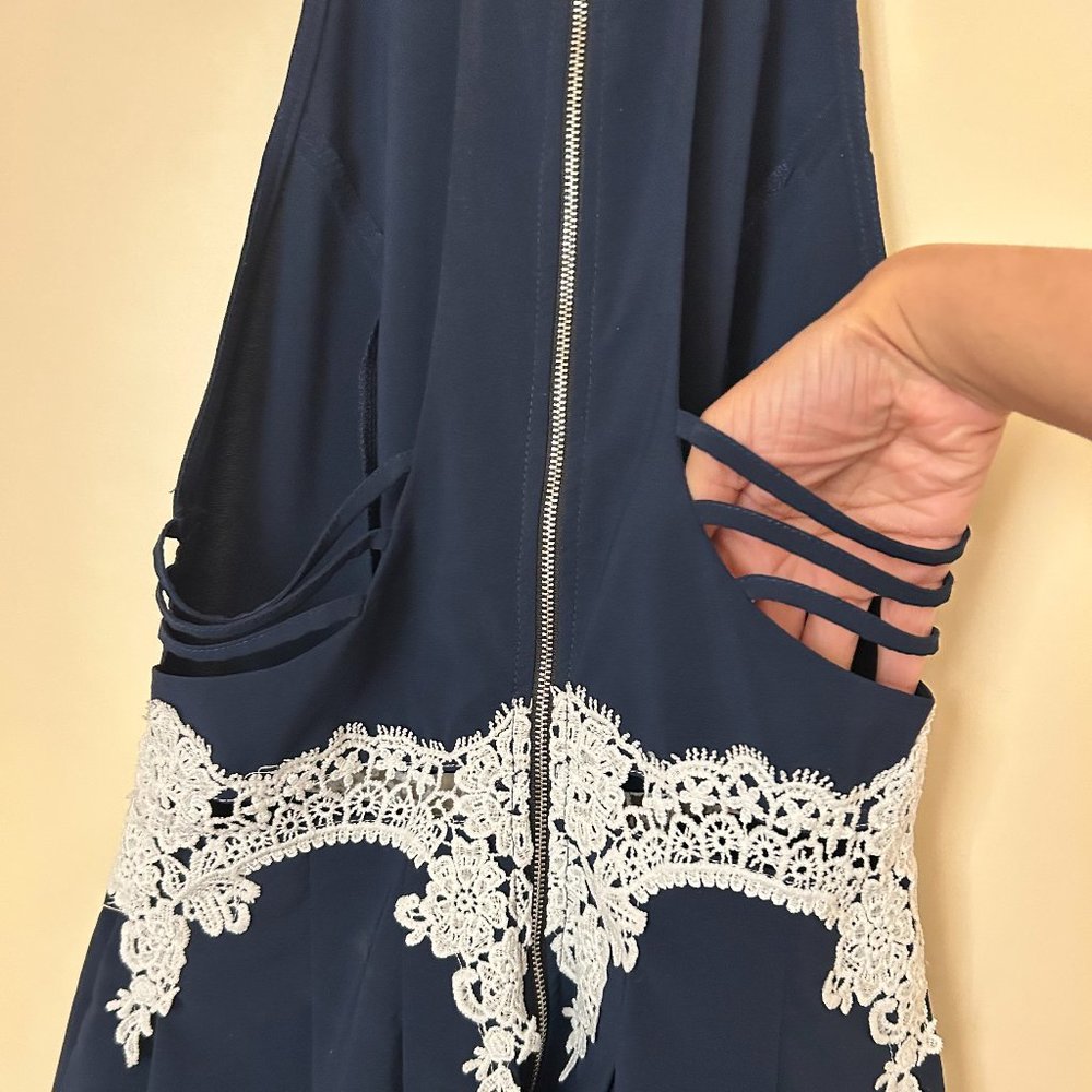 Navy Blue Halter Neck Romper with White Lacy Detail and Open Back - Picture 6 of 8